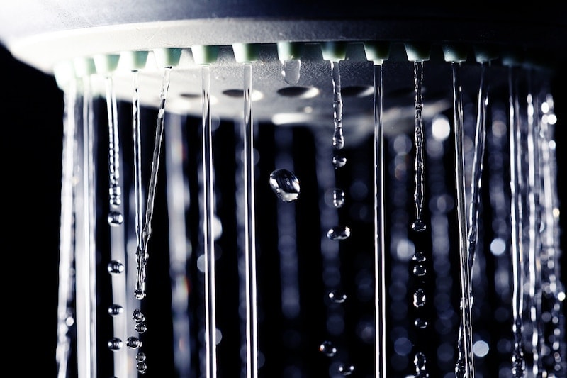 shower water drops on black background